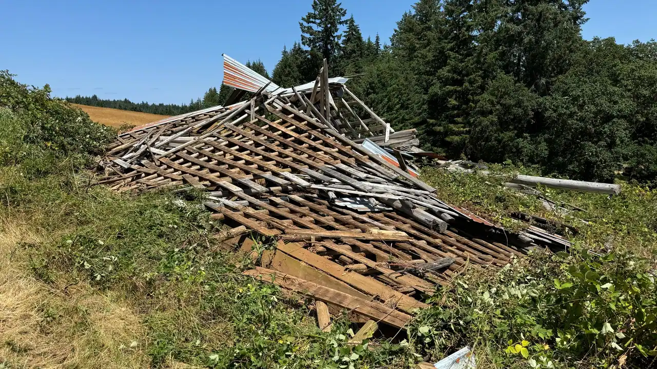 Shed demolition in progress on the Oregon Coast