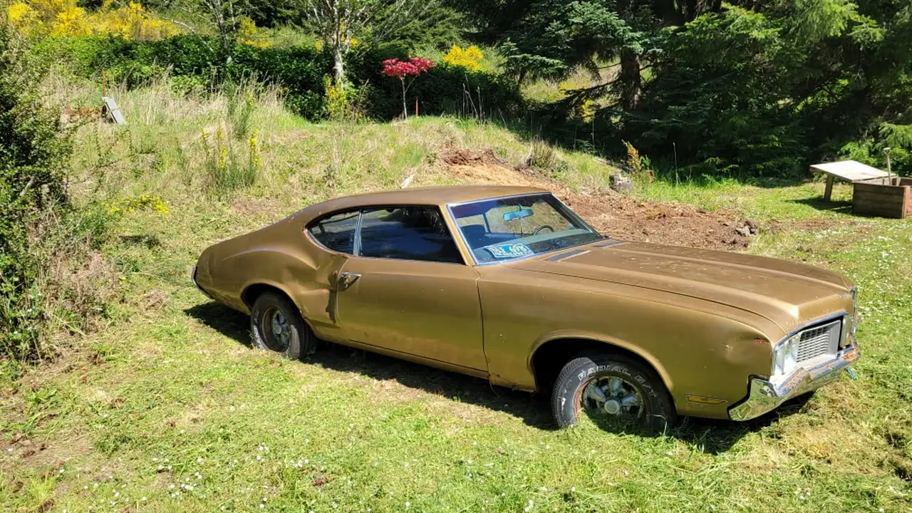 Classic Cutlass ready for junk car removal on the Oregon Coast